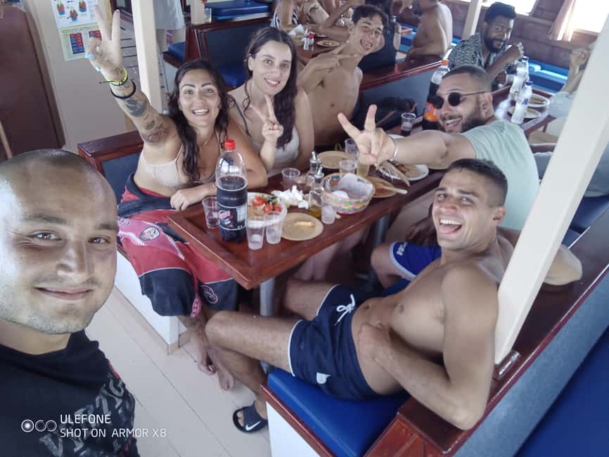 Argostoli: Full-Day Boat Cruise with Lunch - Lunch, wine, and the social side of the trip