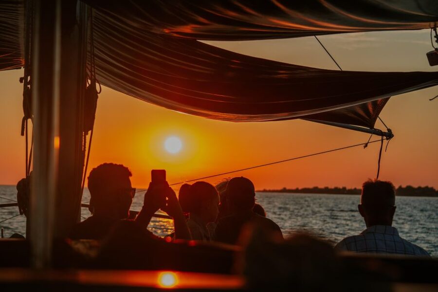 Argostoli: Sunset Cruise with Swim Stops, Dinner, and Wine - Sailing out from Argostoli