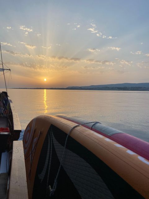 Argostoli: Sunset Cruise with Swim Stops, Dinner, and Wine - Xi Beach or Livadi, depending on the weather