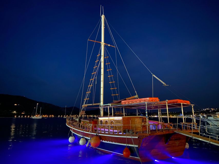 Argostoli: Sunset Cruise with Swim Stops, Dinner, and Wine - Watching sunset from the Ionian Sea