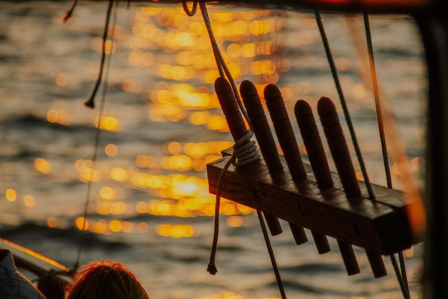 Argostoli: Sunset Cruise with Swim Stops, Dinner, and Wine - Crew, music, and the social side