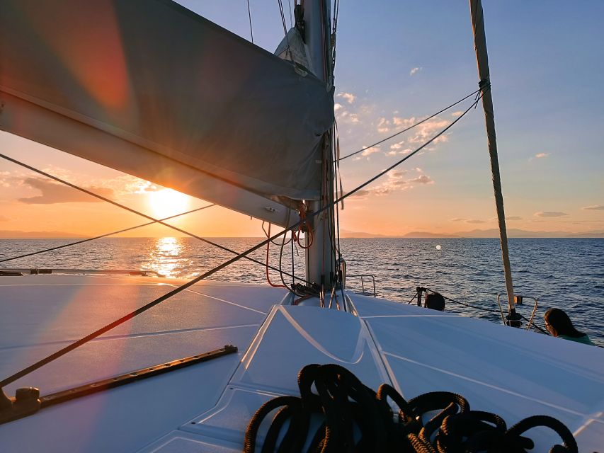 Athens: Catamaran Cruise with Fresh Lunch and Wine - Hydroussa islet: your first swim from the boat