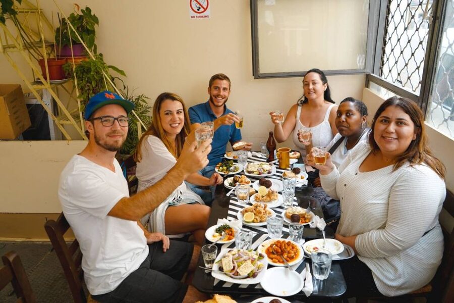 Athens: Evening Food Walking Tour - The guides make the evening work