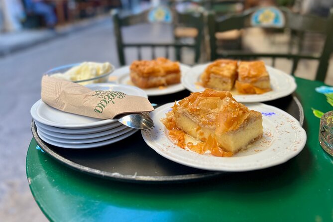 Athens Food Tour with 10+ Tastings of Greek Traditional Dishes - Roman ruins and the Hadrian’s Library setting