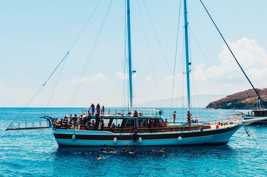 Athens: Full-Day Island Hopping Cruise with Lunch & Transfer - Settling into the wooden boat