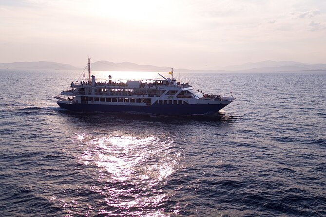 Athens: Island Swimming Day Cruise—DJ, Lunch & Drinks incl. - Lunch, drinks, showers, and the DJ