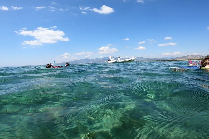 Athens, Nea Makri: Guided Small Group Snorkeling Boat Excursion - Getting fitted out with Dimitris