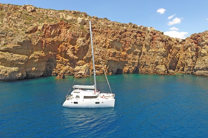 Athens Private Luxury Catamaran Cruise with Traditional Greek Meal and BBQ - The First Swimming Stop