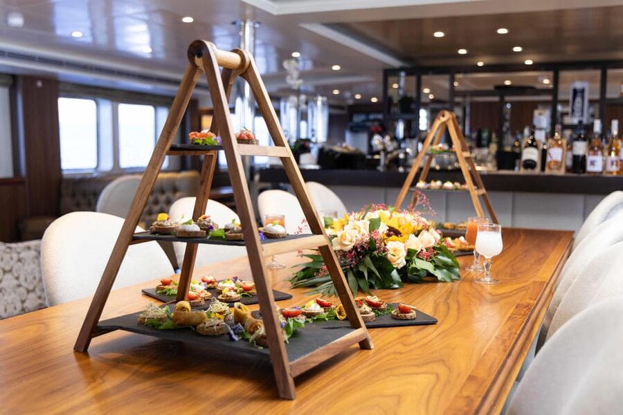 Athens: Saronic Islands Cruise with VIP Area Seating & Lunch - Aegina: town time and ambitious optional sights