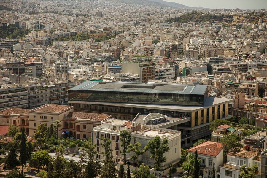 Athens: The Acropolis Museum Guided Tour - Entering a Modern museum built around ancient Athens