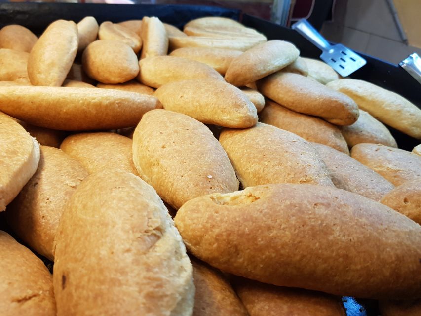 Athens: The Ultimate Food Tasting Tour - Greek tradition, sandals, and everyday craft