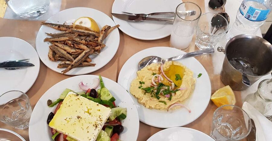 Athens: Traditional Greek food tour in hidden spots - Fish, meat, fruit, and spice markets