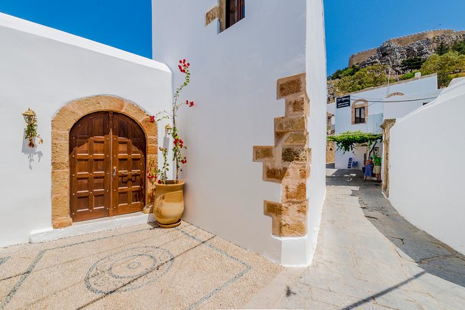 Boat Trip to LINDOS with Swimming Stops at Anthony Quinn's & Tsambika Bays - Three hours among Lindos lanes and ruins