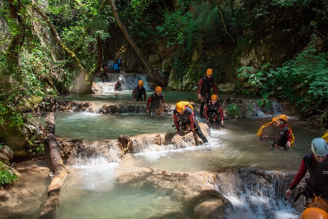 Canyoning Experience in Neda for Beginners - Swimming, slides, jumps, and rock passages