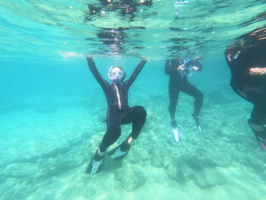 Chania: Boat Trip with Guided Snorkeling Tour - Getting fitted with masks, fins, and a wetsuit