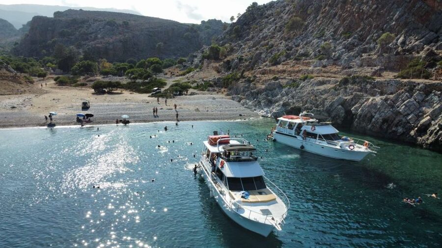 Chania: Menies Beach & Chironisia Bay Cruise with Snorkeling - Menies Beach, ancient Diktynna, and WWII relics