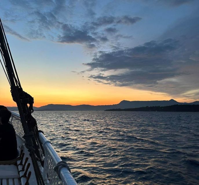 Corfu: Sunset Cruise on Classic Boat with Cocktails & Snacks - Reaching Pontikonissi at sunset
