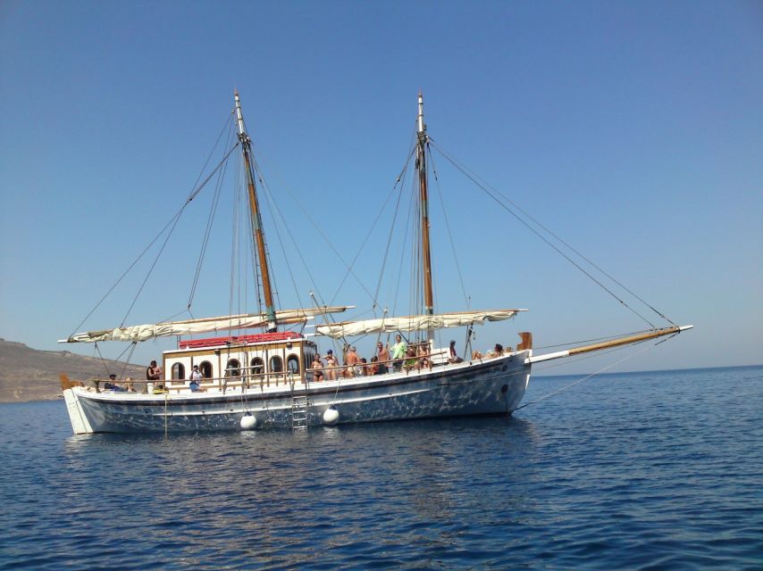Corfu Town: Full-Day Cruise with Lunch, Drinks & Swim Stops - Leaving Corfu’s old port aboard Koryfo