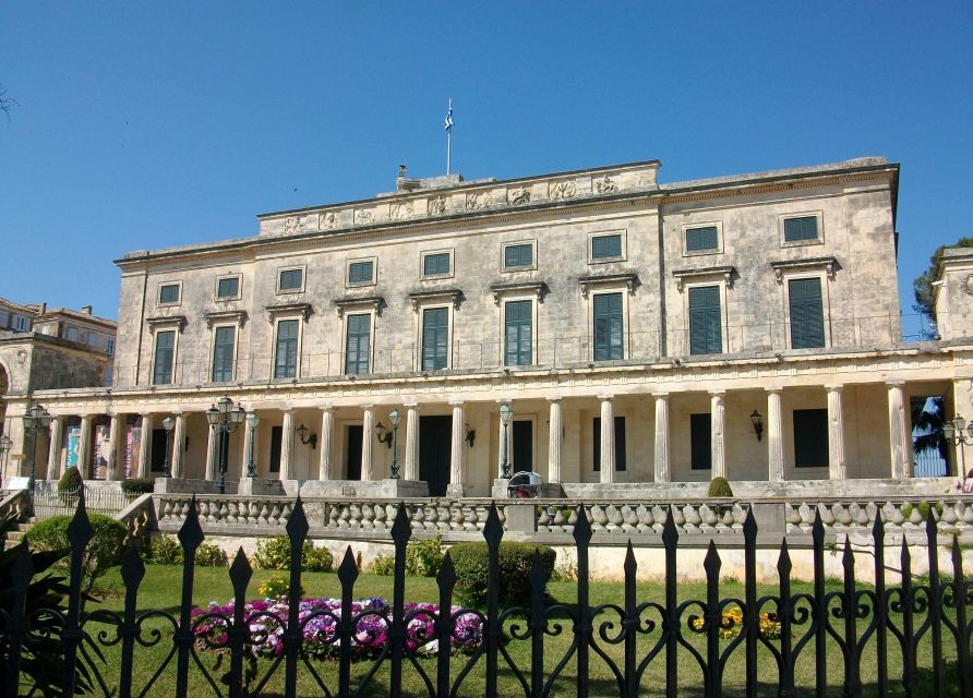 Corfu Town: Guided Walking Tour and Local Food Tastings - Sitting down to pastitsada and sofrito