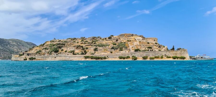 Crete: Day Trip to Agios Nikolaos and Spinalonga Island - Elounda: lunch, shore time, and a view of Spinalonga