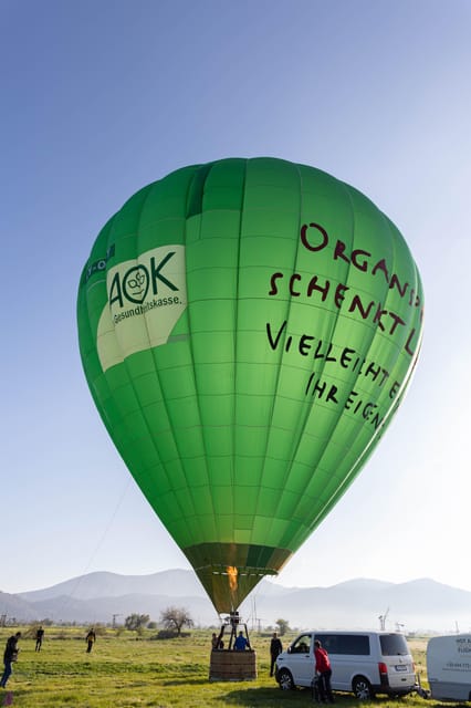 Crete: Hot-Air Balloon Flight with Breakfast and Wine - Helping prepare the balloon before takeoff