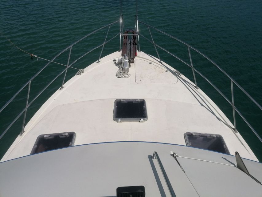 Crete: Snorkeling Boat Trip with Lunch and Transfer - The first swim: a short stop for a jump and cool water