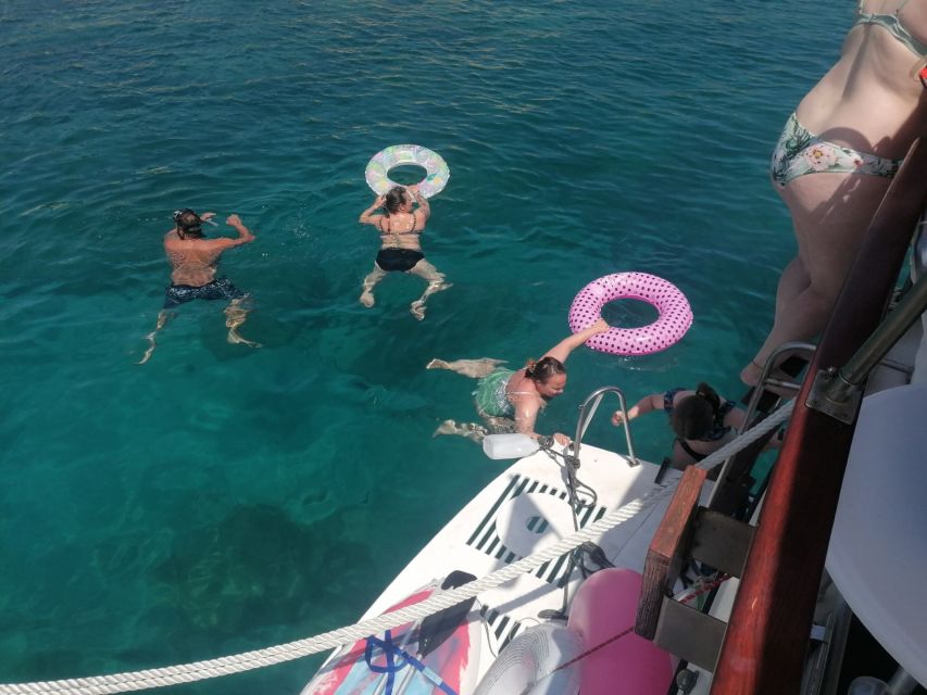 Crete: Snorkeling Boat Trip with Lunch and Transfer - The crew and the tone of the outing