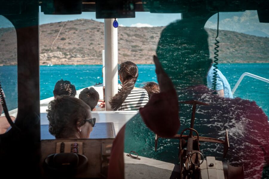 Elounda: Spinalonga Guided Boat Tour with BBQ and Swimming - Spinalonga and its layered past