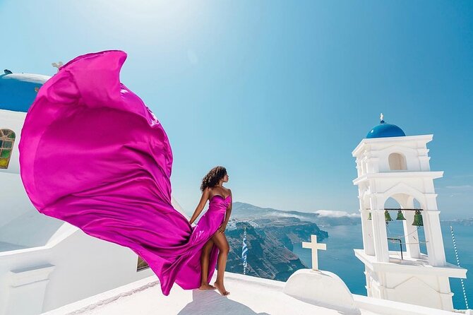 Exclusive Santorini Flying Dress Photoshoot with Pickup - From your hotel to the Imerovigli studio