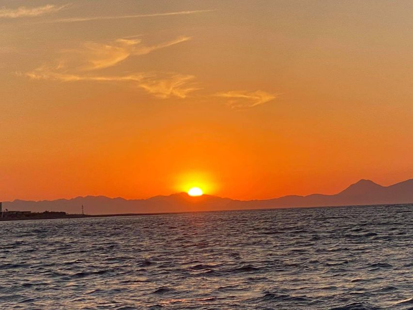 Faliraki: Evening RIB Cruise with Champagne and Sunset Views - Crossing Rhodes from east coast to west