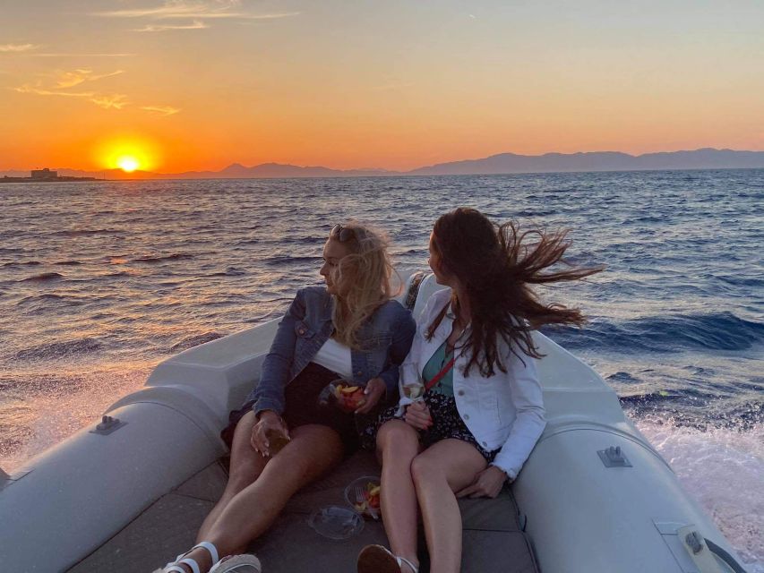 Faliraki: Evening RIB Cruise with Champagne and Sunset Views - Secluded bays and the approach to Rhodes Town