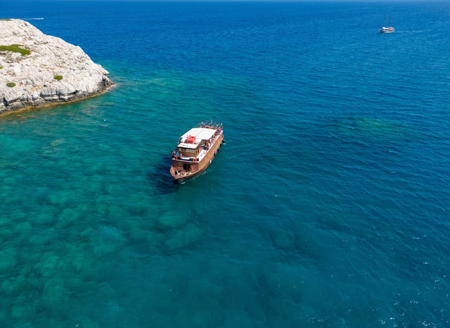 Faliraki : Transfer & Cruise to Lindos with 3 Swimming Stops - Staff support and the Captain Sparrow touch