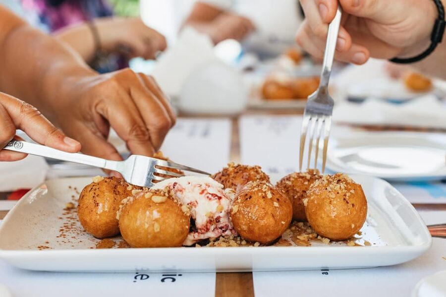 Fira: Guided Foodie Walking Tour with Tastings - Mezes at a traditional tavern