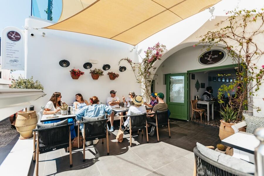 Fira: Guided Foodie Walking Tour with Tastings - Fira’s lanes, market, and souvlaki stop