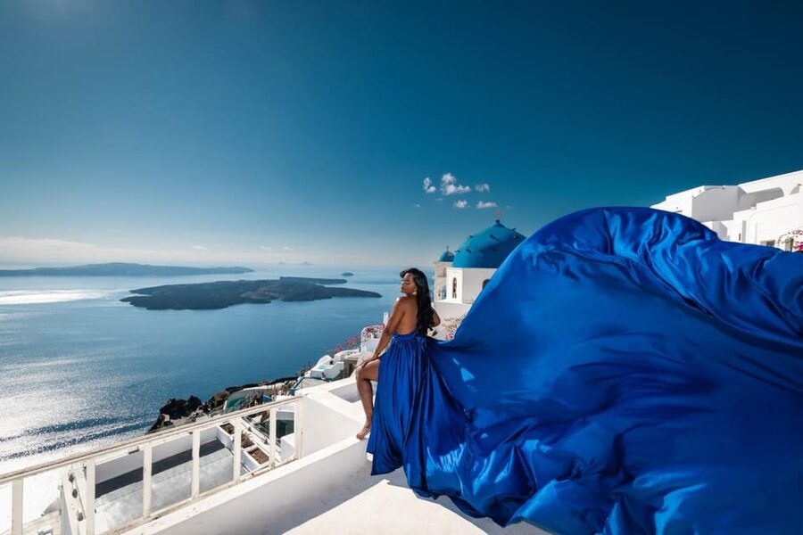 Flying dress Photoshoot in Santorini with Hotel Pickup - Choosing a flying dress in the private studio