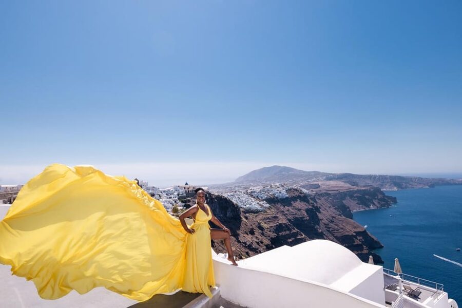Flying dress Photoshoot in Santorini with Hotel Pickup - Private SUV pickup from seven Santorini areas