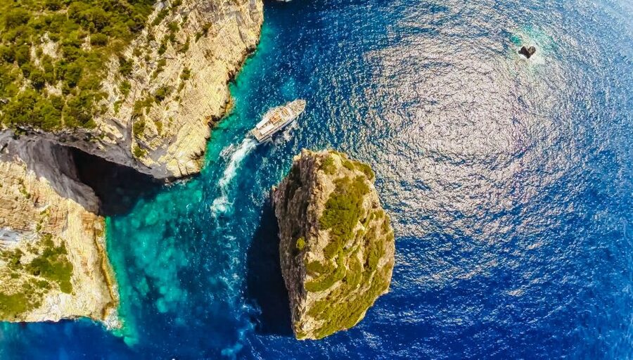From Corfu: Day Cruise to Paxos, Antipaxos, and Blue Caves - The guides, languages, and onboard mood