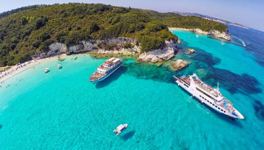 From Corfu Island: Antipaxos & Paxos Blue Caves Boat Cruise - Leaving Corfu With Castle Views