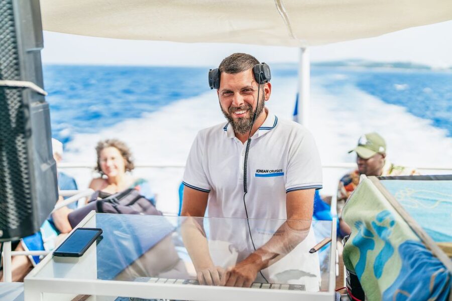 From Corfu Island: Antipaxos & Paxos Blue Caves Boat Cruise - Guides, Languages, and Onboard Service