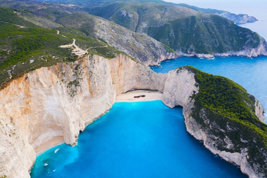 From Kefalonia: Blue Cave Boat Cruise & Shipwreck Photo Stop - Alykanas for food and a slower hour