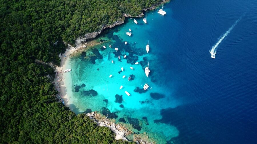From Lefkimmi: Syvota, Blue Lagoon and Cave Sunset Cruise - Sivota village, dinner, and waterfront time