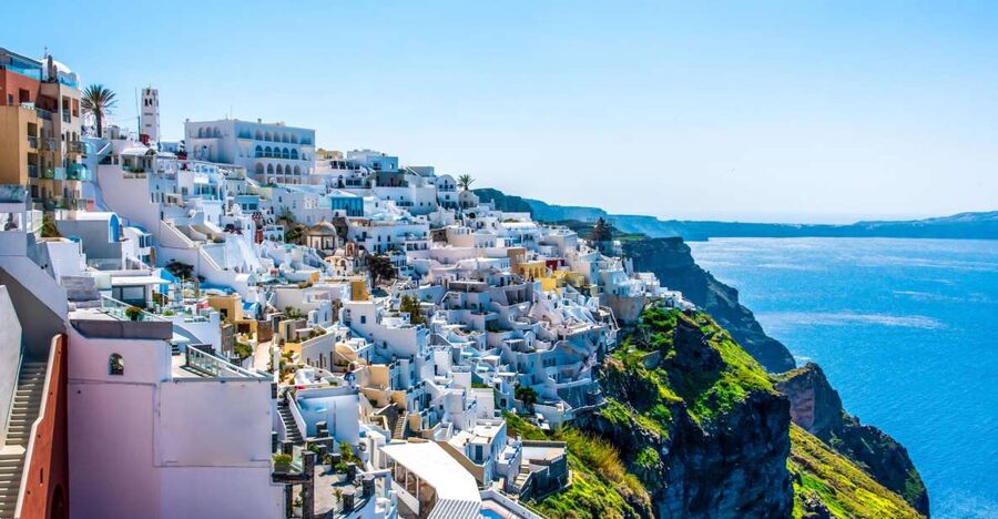 From Paros: Santorini Full-Day Boat Trip - Arriving below Santorini’s caldera cliffs