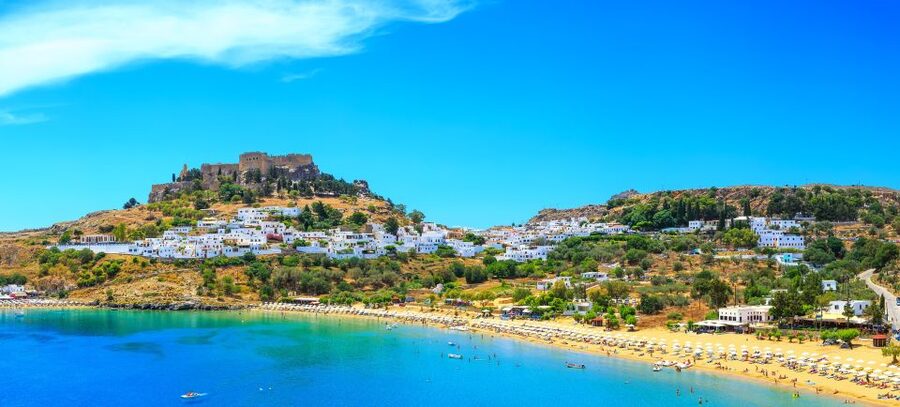 From Rhodes: Lindos Village and Acropolis Guided Tour - Walking through Lindos to the Acropolis
