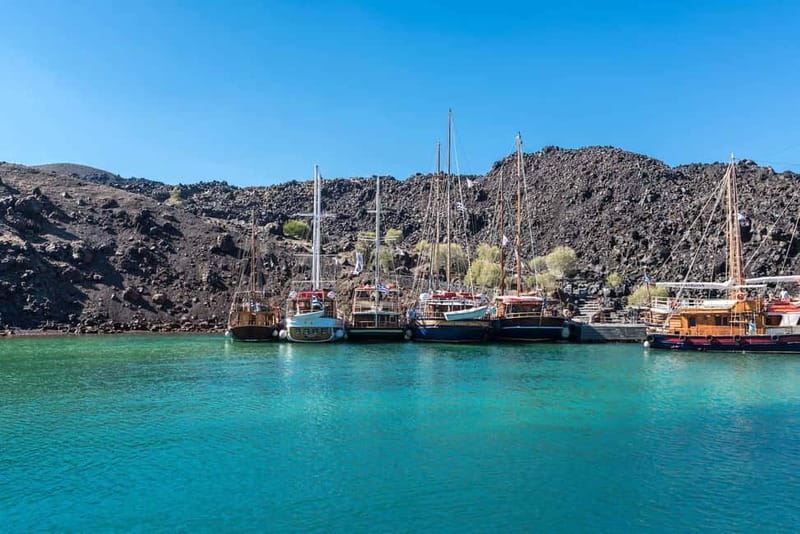 From Santorini: Volcano Cruise With Oia Sunset - Cruising through the caldera from Athinios