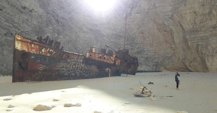 From St.Nikolaos: Boat Cruise to Navagio Beach & Blue Caves - The Blue Caves by glass-bottom boat