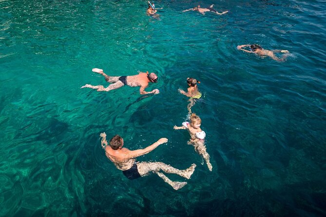 Full Day Boat Cruise to 3 Islands with optional pickup - Plati: clear water and swimming from the boat