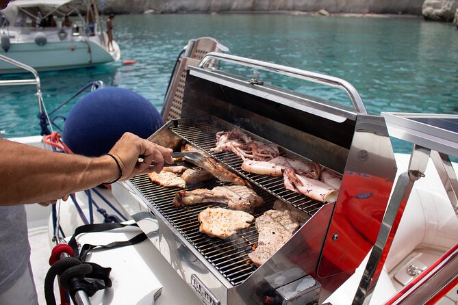Full-Day Small-Group Cruise in Milos & Poliegos with Lunch - Gerakas Beach, hot water, and a Greek barbecue