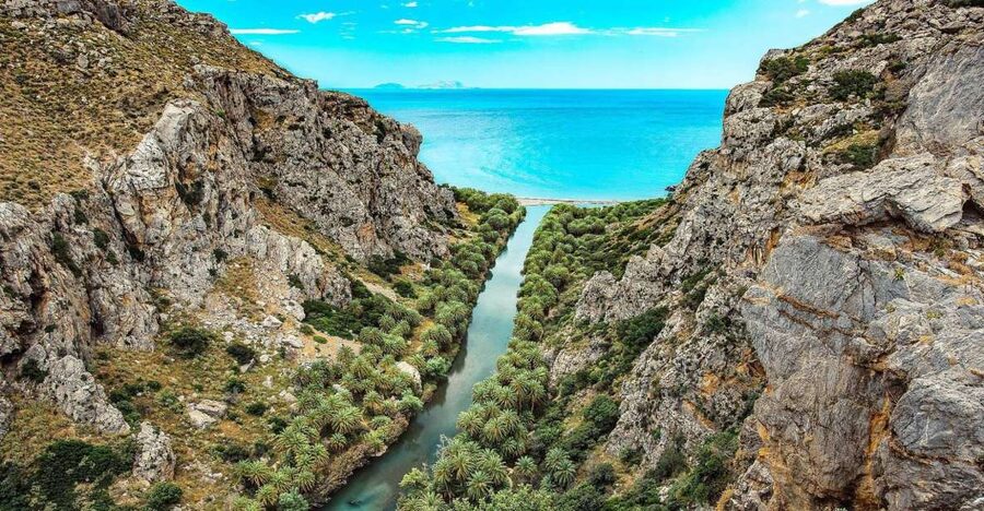 Georgioupolis: Preveli Palm Beach Day Trip by Bus and Boat - The coach ride from Georgioupolis to South Crete