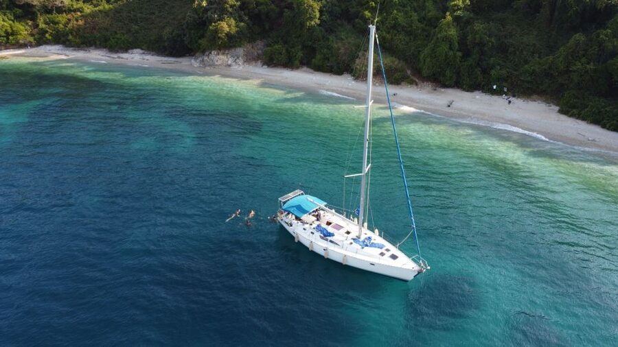 Gouvia: Corfu Island Sailing Trip with Snack and Soft Drinks - Gialiskari: swimming, snorkeling, and the optional cliff jump