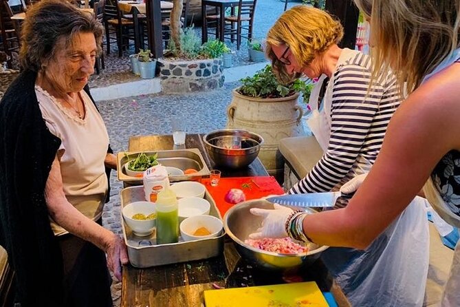 Greek Cuisine Cooking Class in Santorini with Recipes and Wine - Meeting Chef Christos and getting to work